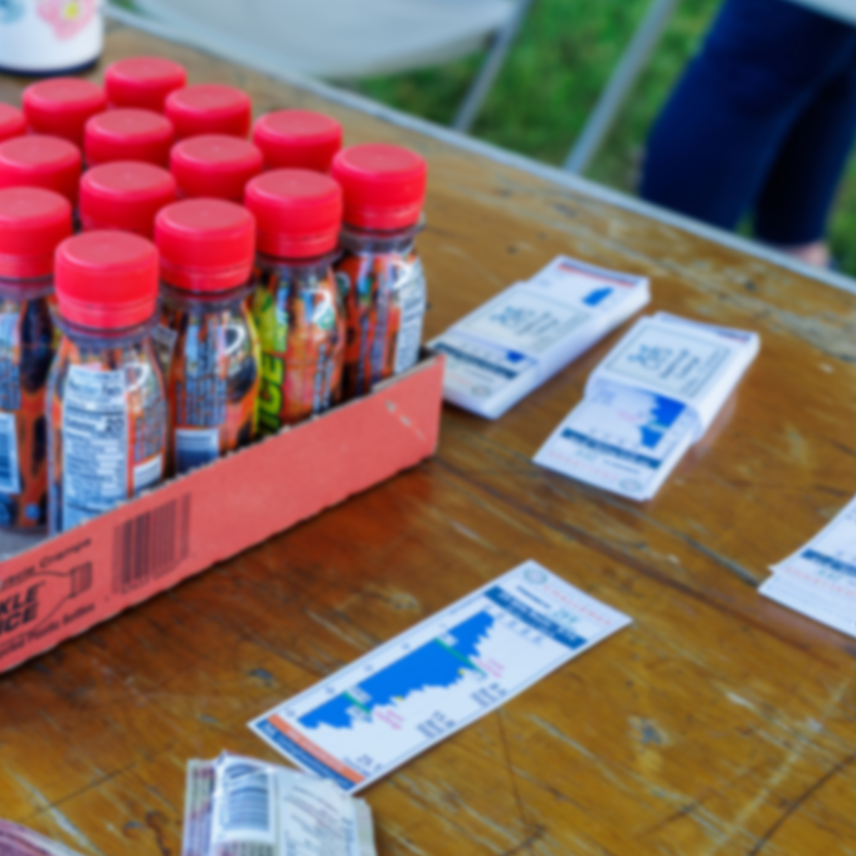 A cycing event table with sets of stickers to share